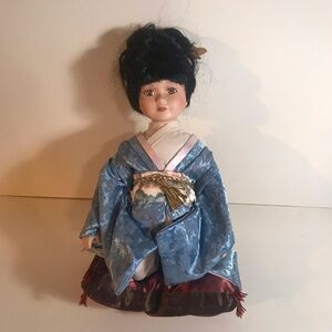 Heritage Signature Collection Blue Kimono Porcelain Kneeling Mai With Pillow
